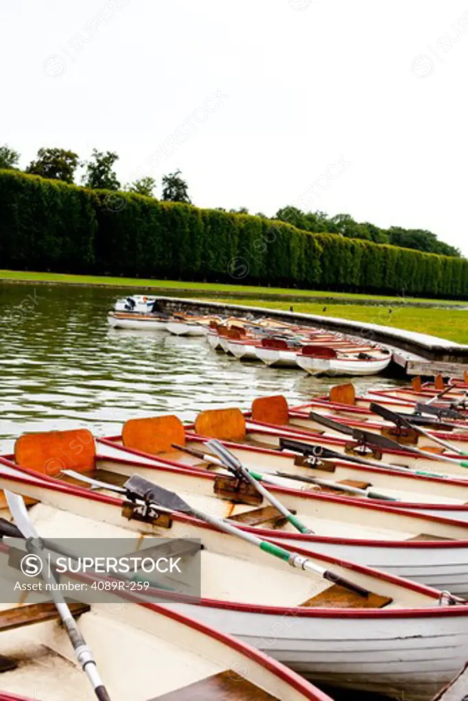 Boats moored in a canal, Grand Canal, Chateau De Versailles, Versailles, Paris, Ile-De-France, France