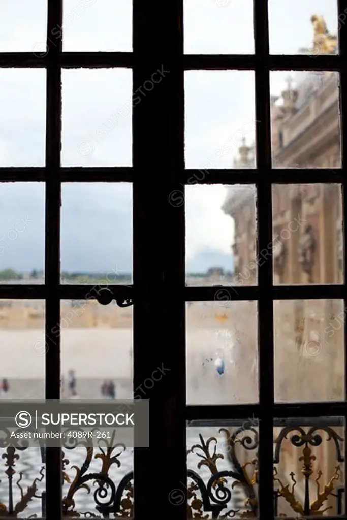 Tourists viewed through the window of a palace, Chateau De Versailles, Versailles, Paris, Ile-De-France, France
