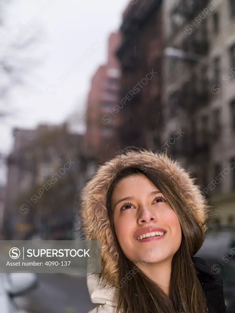 Close-up of a teenage girl smiling, New York City, New York State, USA