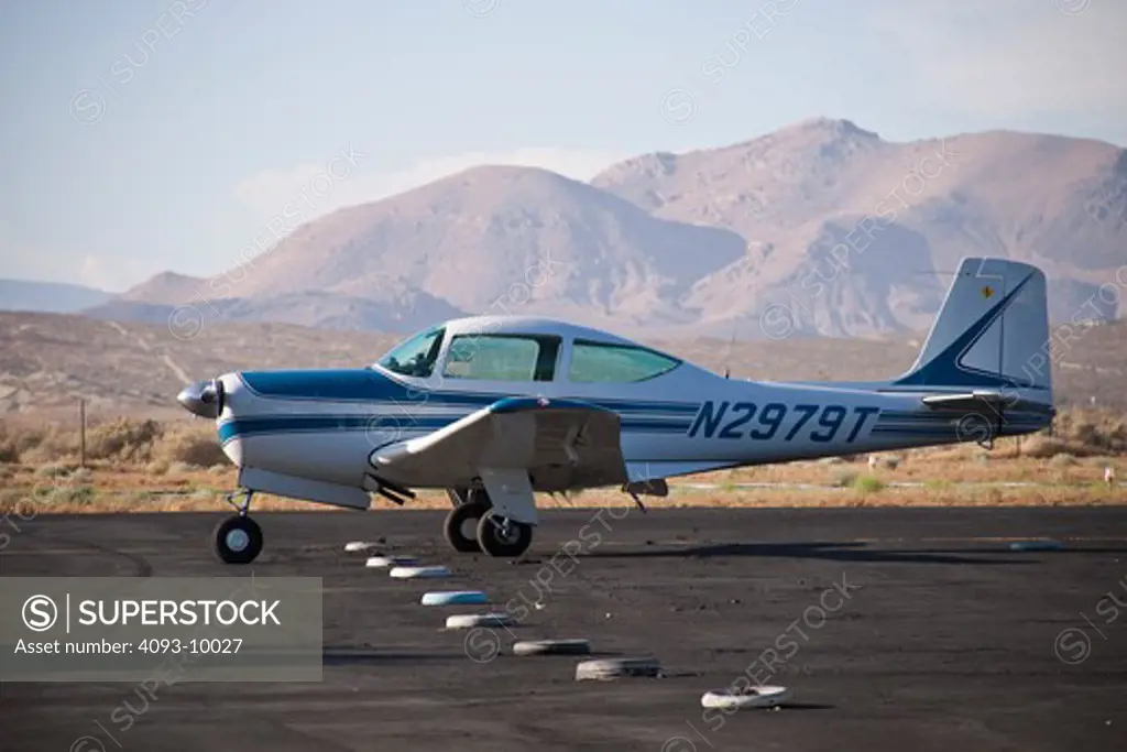 A Meyers 200D parked at Rosamond, CA airport. The Meyers 200 is a single engine piston airplane and was designed by Al Meyers in the late 1950's and built by the Meyers Aircraft Company until 1965. Aero Commander then built them until 1967. It has a cruise speed of 210 mph and is considered one of the fastest airplanes in it's class.