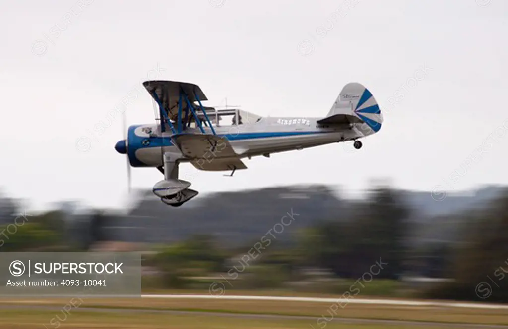 Airshow pilot Eddie Andreini flying his rare 500 horsepower Boeing Super Stearman at the Watsonville, CA airshow. Eddie's plane has been highly modified specifially for airshow performances.