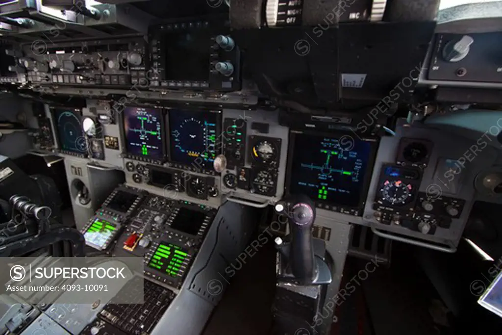Interior cockpit view of the Boeing (formerly McDonnell Douglas) C-17 Globemaster III. The C-17 is a large military transport aircraft. It was developed for the United States Air Force and is used for rapid strategic airlift of troops and cargo to main operating bases or forward operating base anywhere in the world. It has the ability to rapidly deploy a combat unit to a potential battle area and sustain it with on-going supplies.