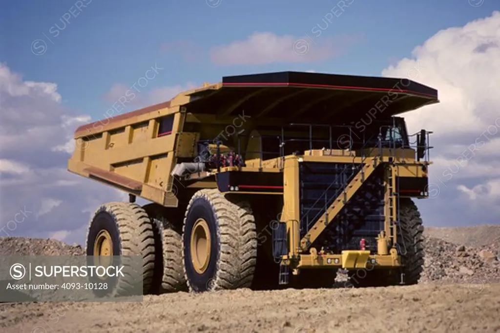 low angle dump truck earth mover yellow