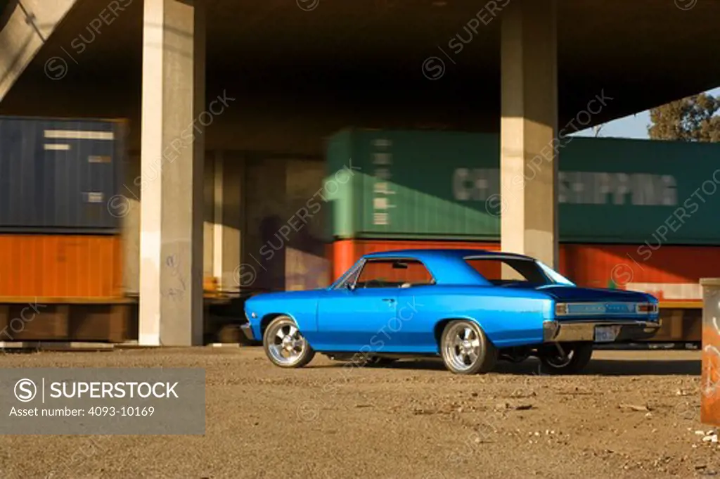 1966 Chevrolet Chevelle Blue near train tracks