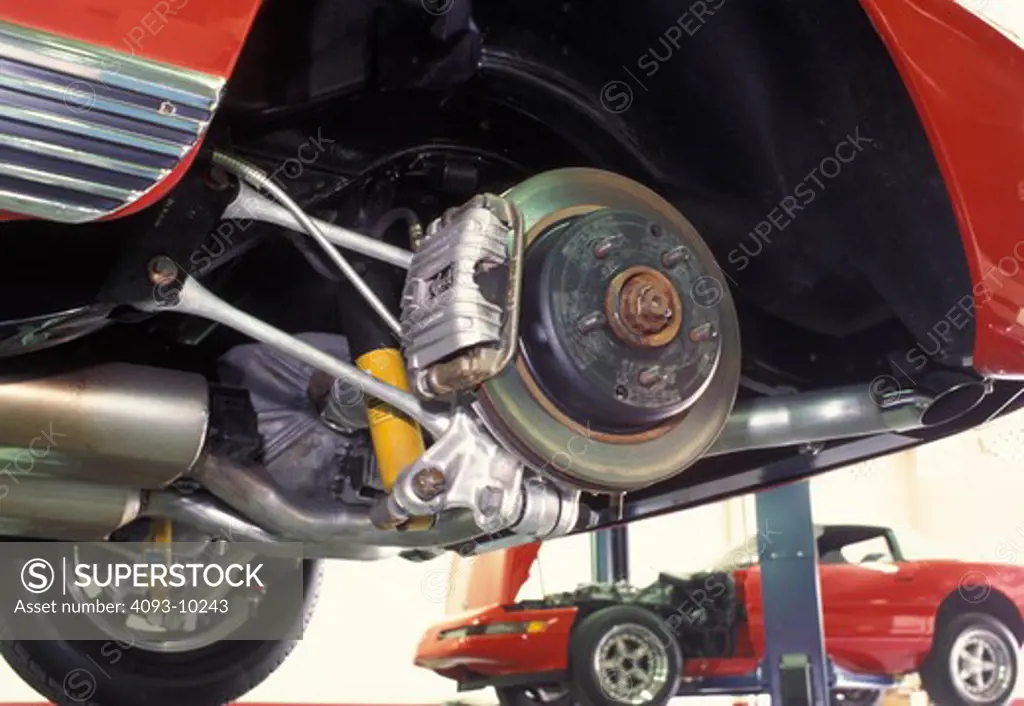 detail Corvette C-4 1962 1960s custom wheel disc brake caliper IRS independent rear suspension lift underneath modified