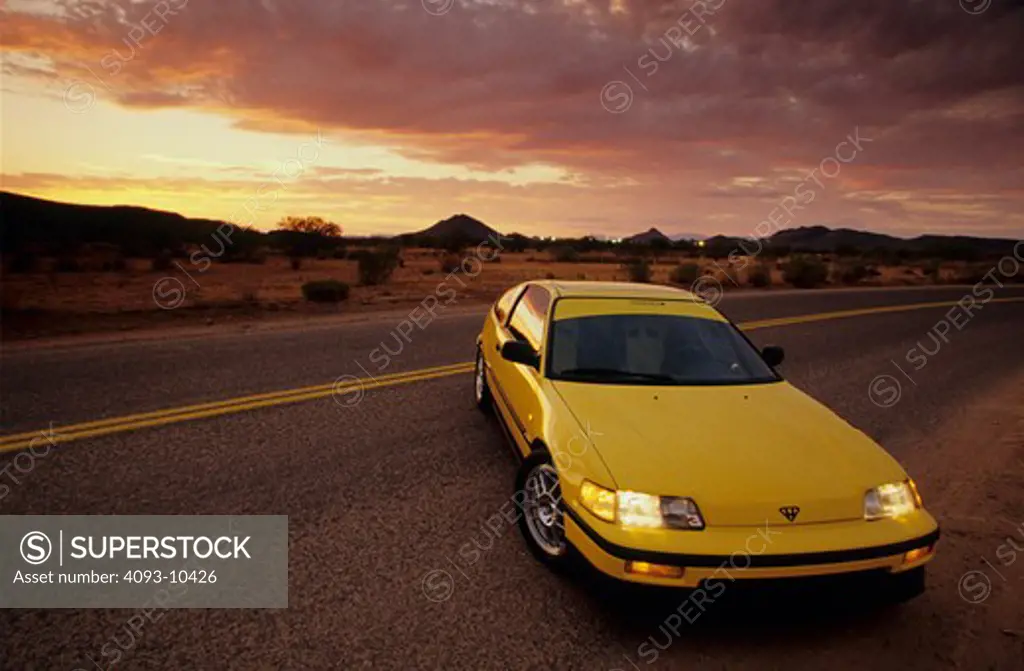 Honda Civic CRX 1991 1990s hatchback yellow street
