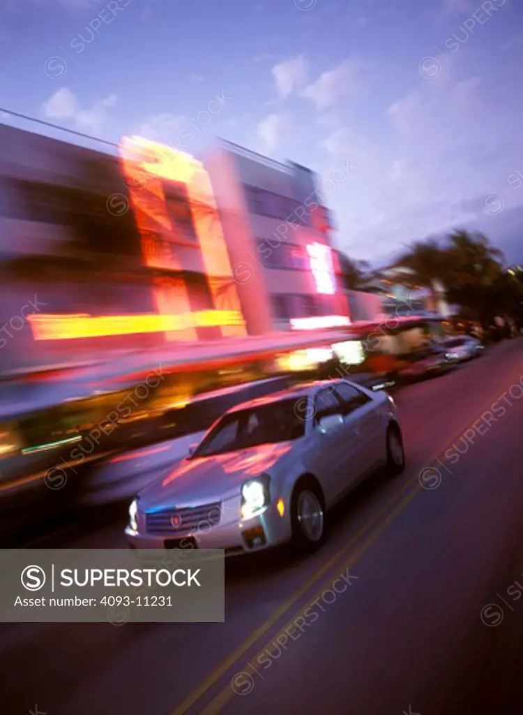 Cadillac CTS 2003 silver Miami neon headlights street