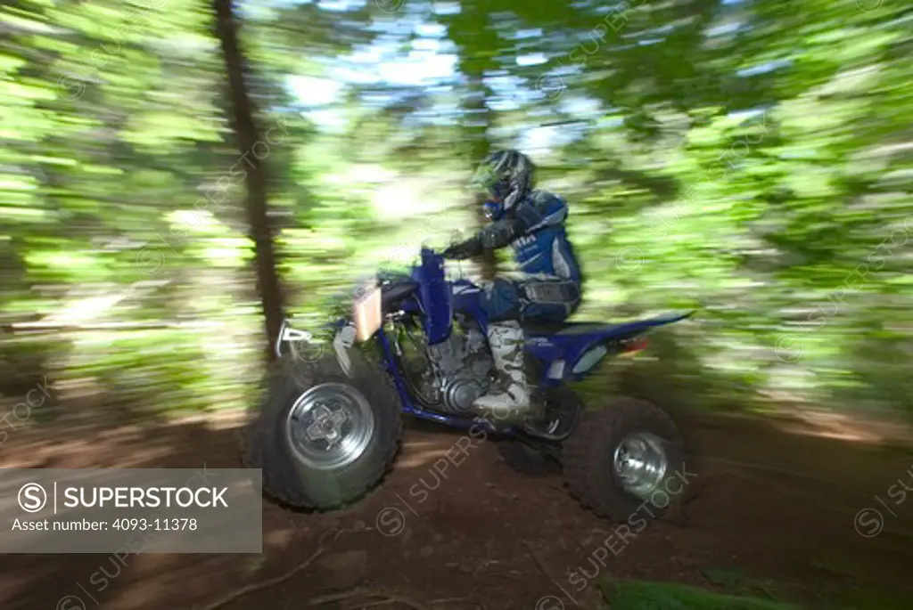Yamaha Raptor ATV quad 2003 blue rider wheelie
