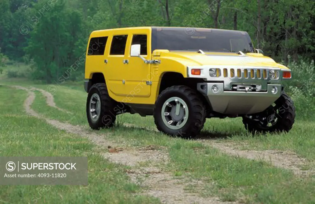 GMC Hummer H2 concept show car prototype yellow front 3/4 beauty grass trees off-road