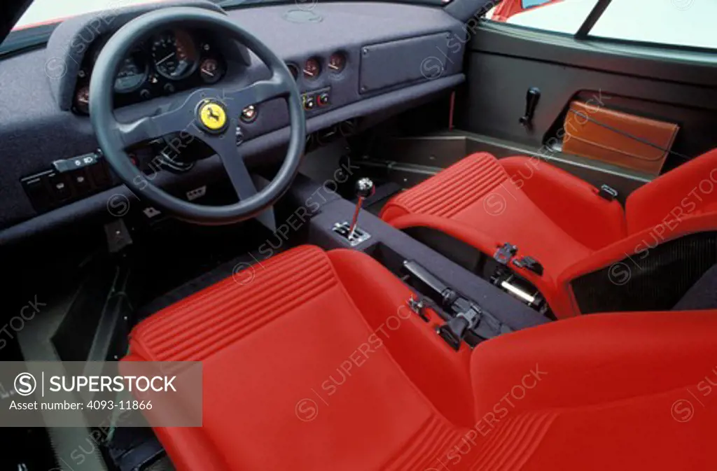 interior Ferrari 1991 F40 detail red front seat gear shift steering wheel dashboard emergency brake door IP instrument panel gauges tool kit 1990s