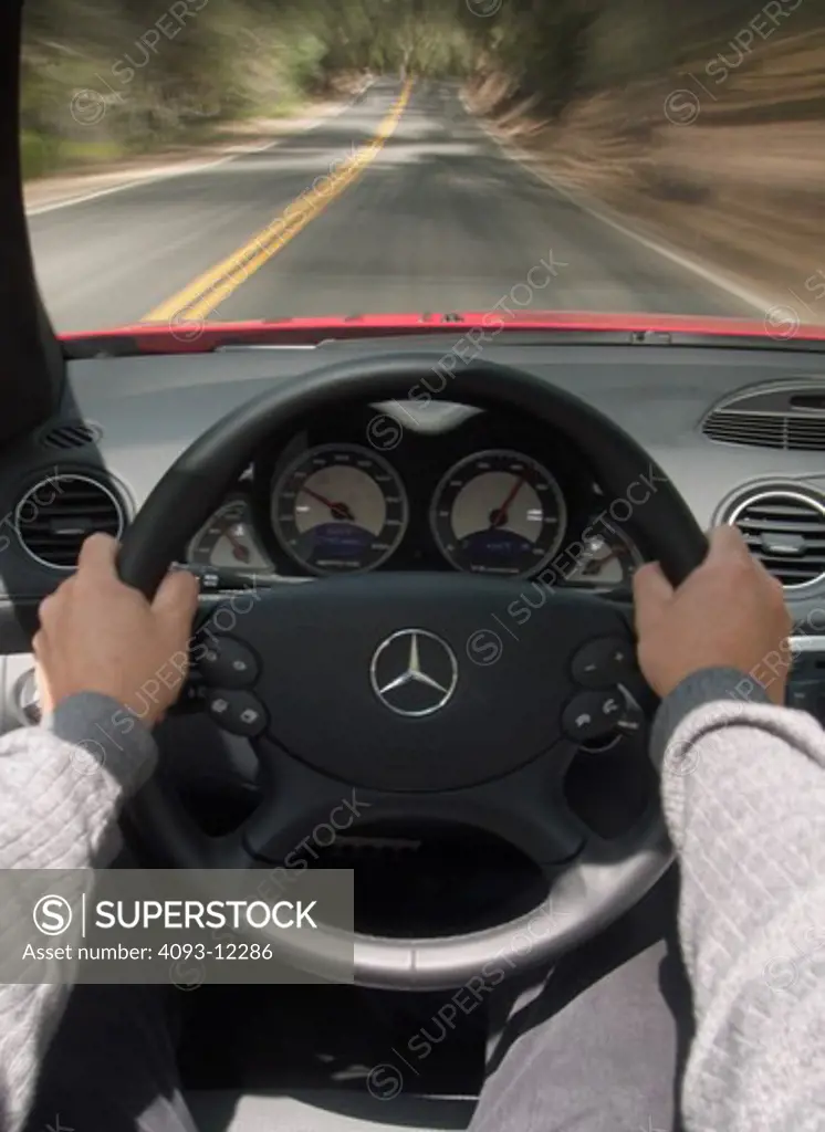 interior detail Mercedes Benz SL55 SL-Class 2003 hands steering wheel gauges speedometer tachometer street