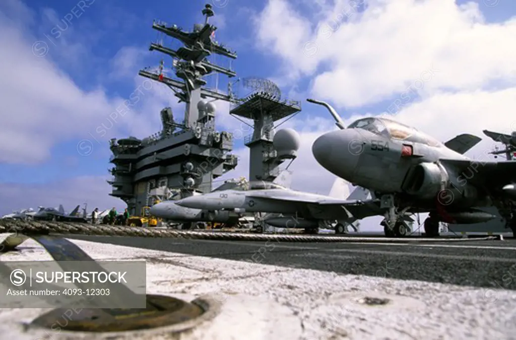low angle Military Jets Grumman Fixed Wing Boeing Aviat Airplanes A-6 Intruder FA-18 Hornet grey aircraft carrier control tower radar tower