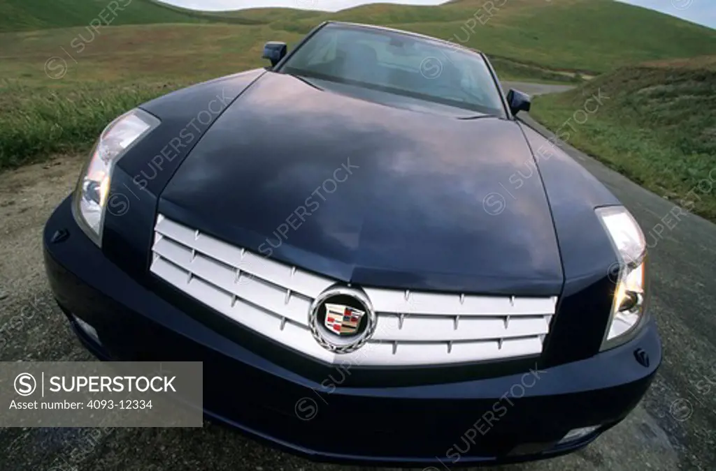 Cadillac XLR 2004 blue wide angle grille street