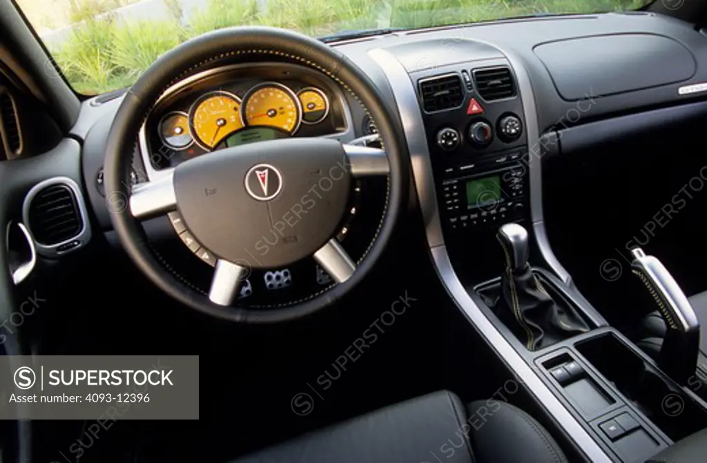 interior Pontiac GTO 2004 steering wheel black leather seats emergency brake gear shift silver