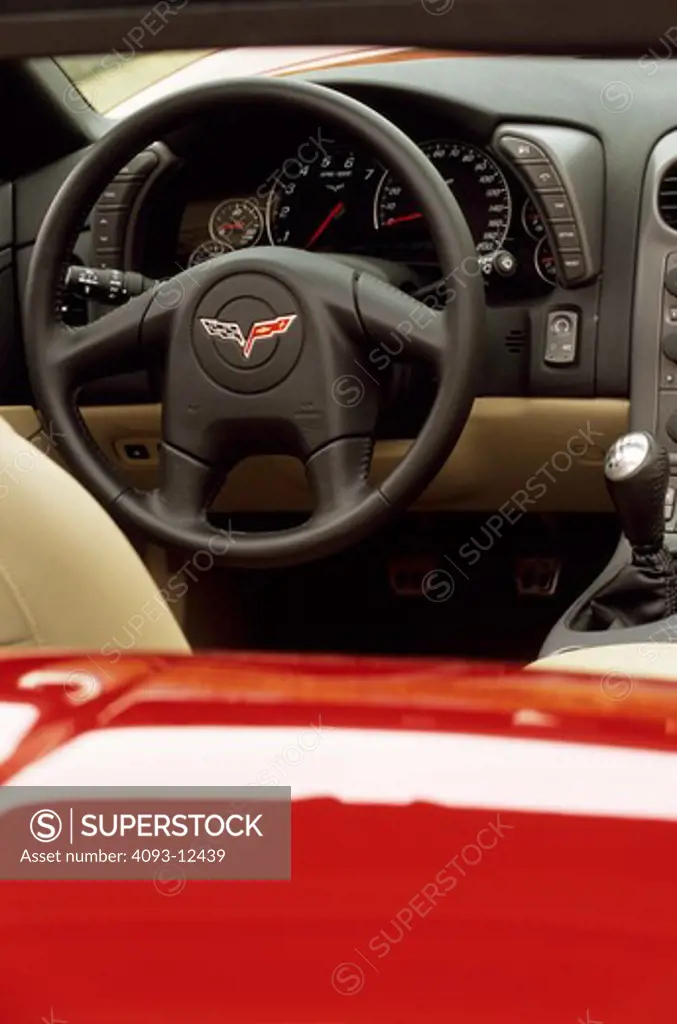 interior Corvette C6 2005 red steering wheel tan leather seat gear shift gauges silver trim