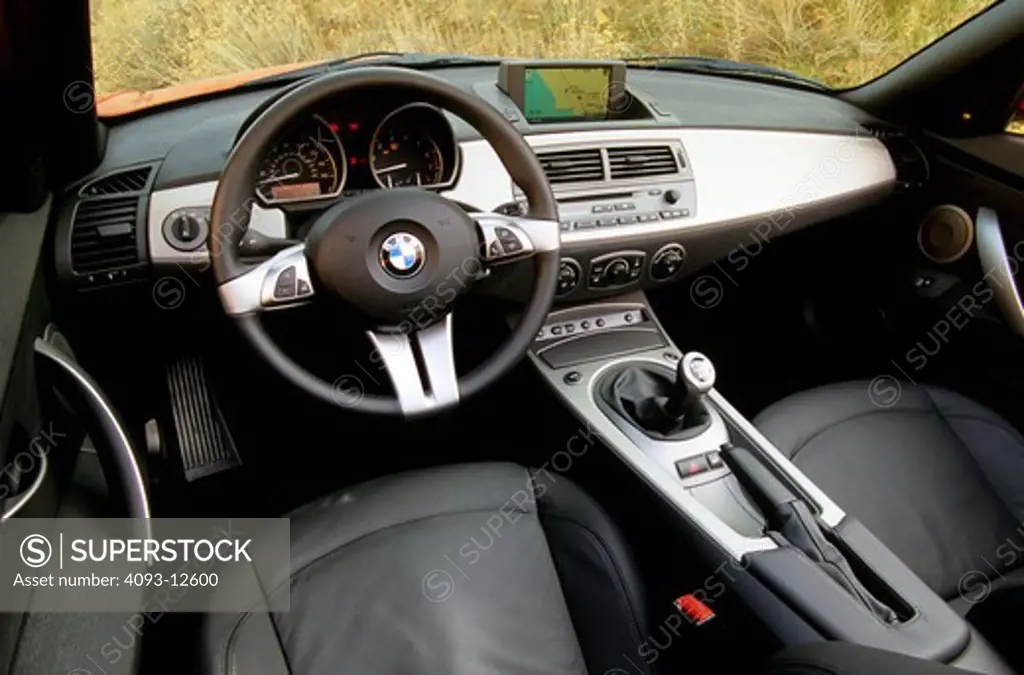 interior BMW Z4 2005 steering wheel gauges gear shift dashboard aluminum black leather seats nav screen