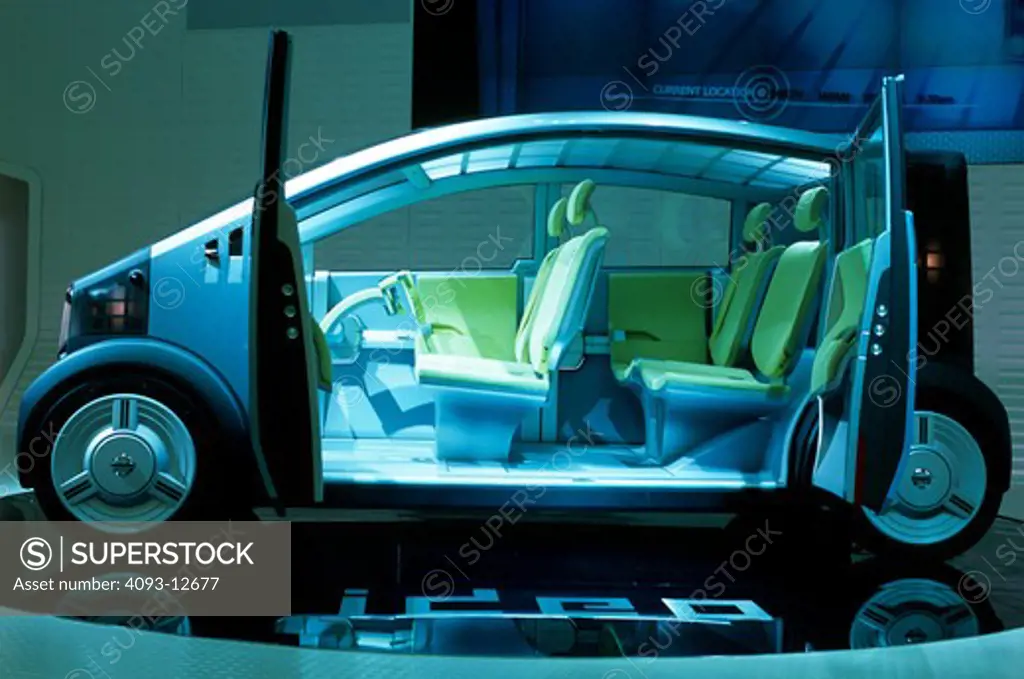 interior Nissan Ideo blue seats green suicide doors