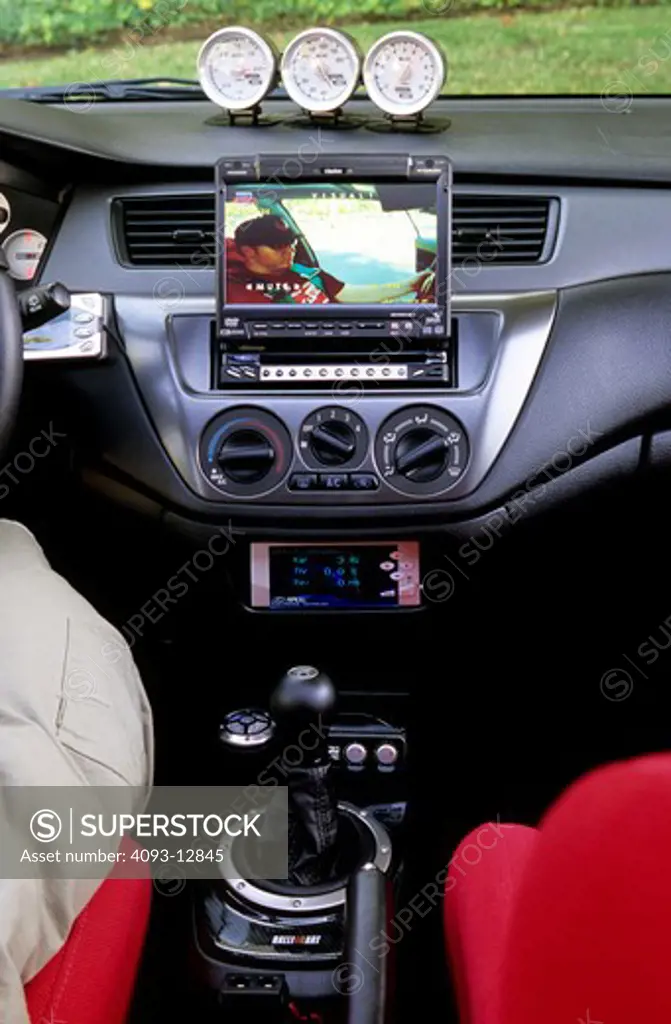 interior Mitsubishi Lancer Evolution 8 dashboard black gauges radio gear shift screen