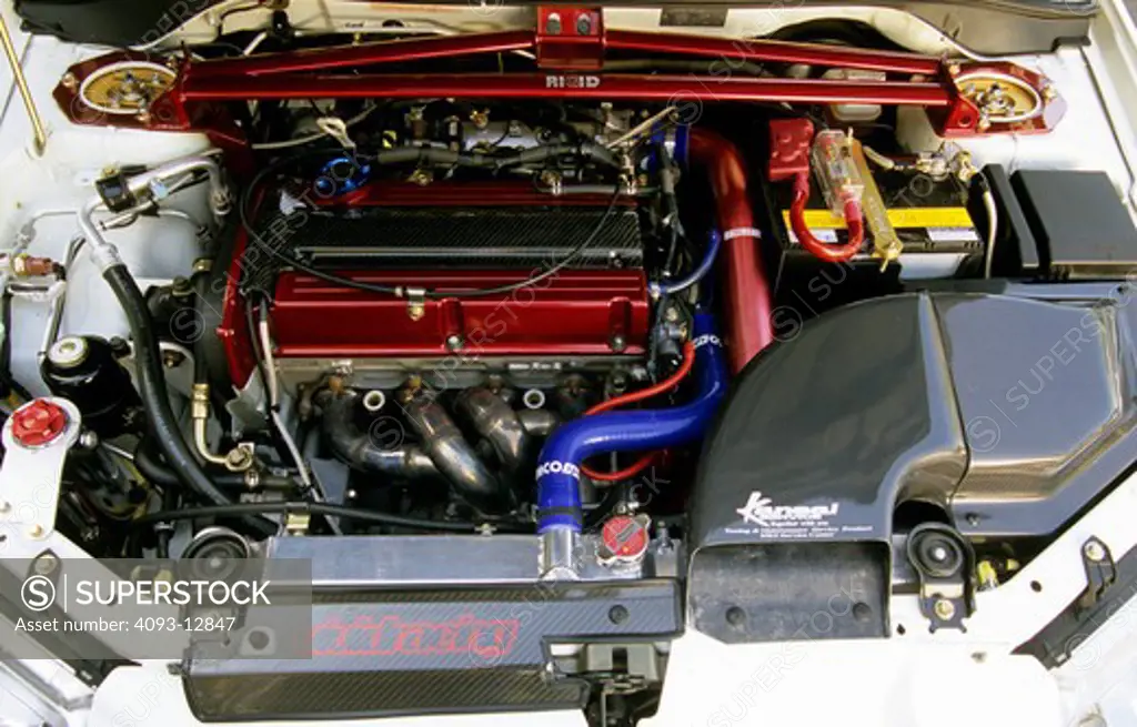 Mitsubishi Lancer Evolution 8 2004 white inatke valve cover red hoses brace header exhaust manifold