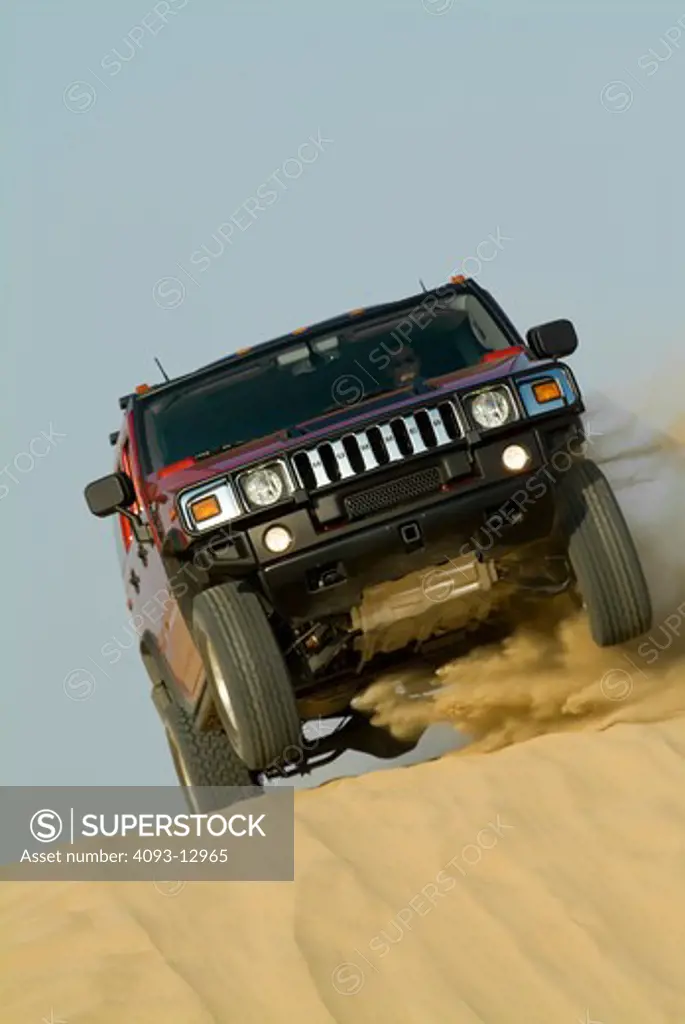 2006 Hummer H2 Orange Jumping getting air in sand dunes