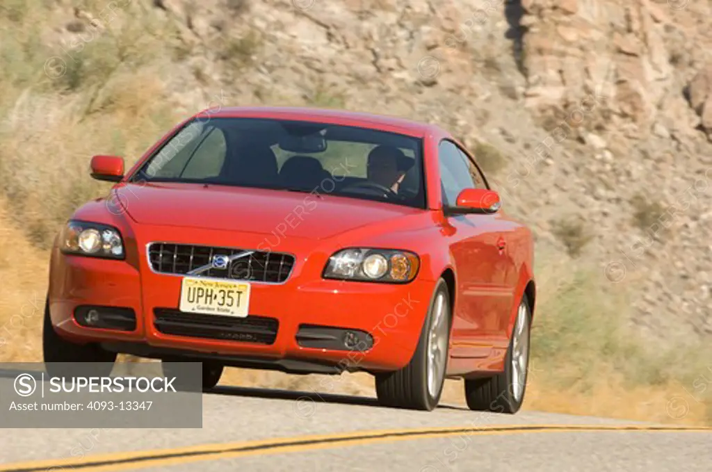 2007 red Volvo C70 retractable hardtop. Considered both a Convertible and a Coupe.