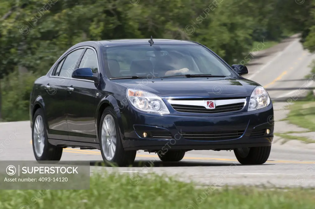 Saturn Aura XR driving along road