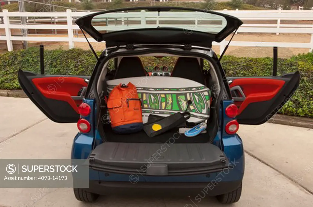 Smart ForTwo Passion Cabriolet parked with trunk open, rear view