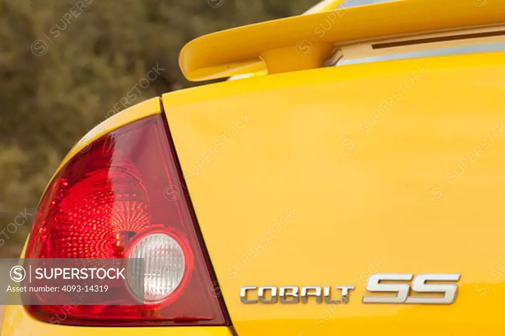 Yellow Chevrolet Cobalt SS rear view, close-up