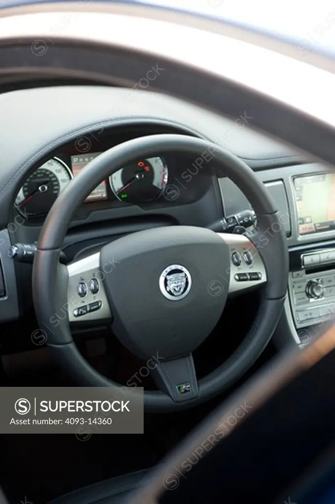 2009 Jaguar XF Type R interior, close-up on steering wheel
