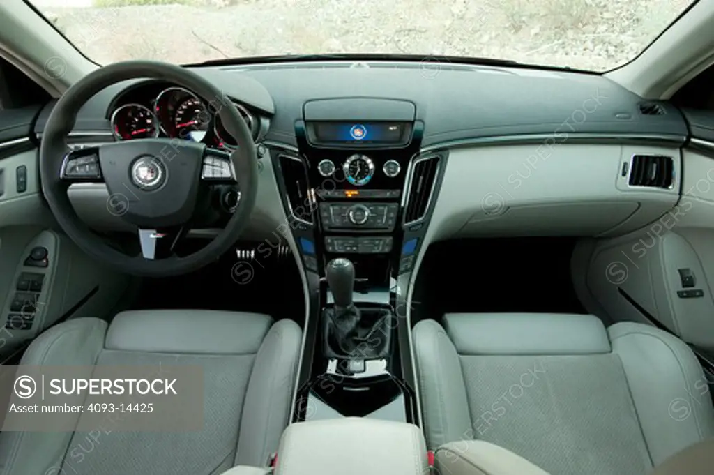 2009 Cadillac CTSV, interior, close-up of steering wheel and IP panel