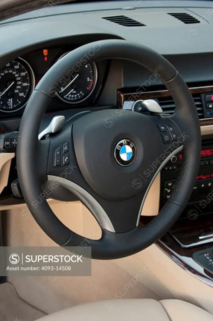 2009 BMW 335d interior, close-up of steering wheel and instrument panel
