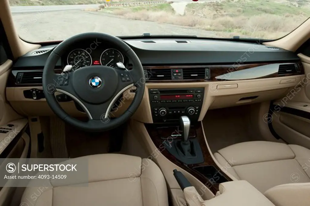 2009 BMW 335d interior, close-up of steering wheel and instrument panel