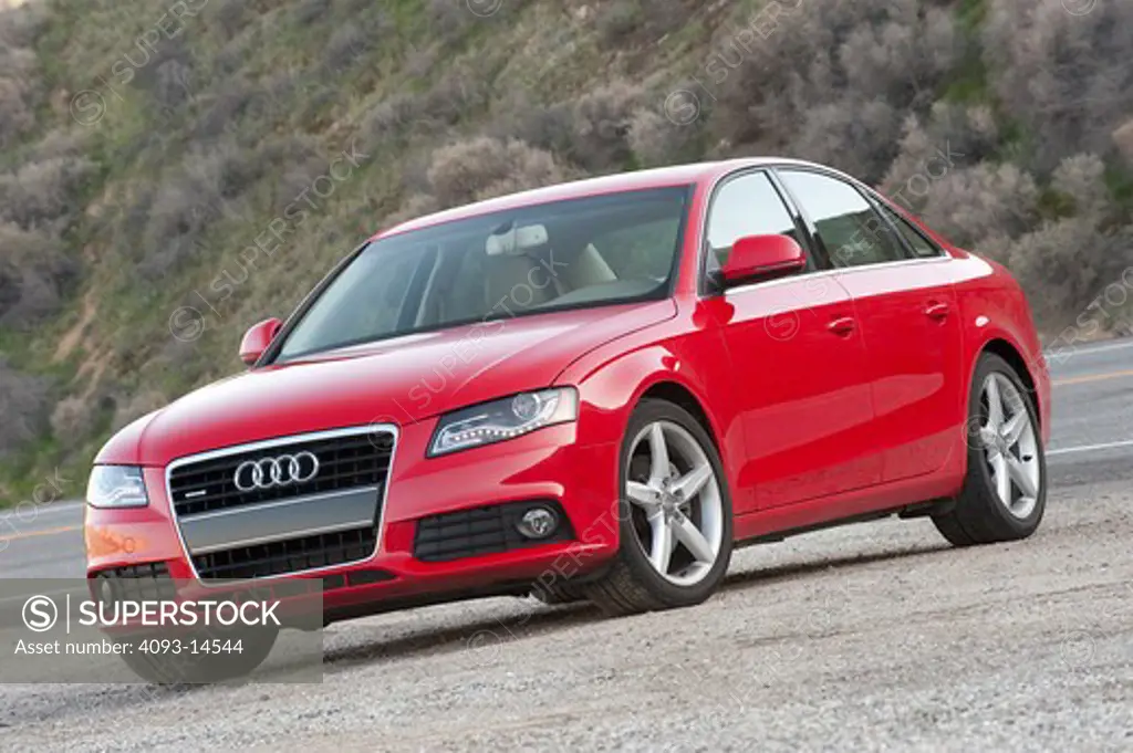 2009 Audi A4 on the road, front 3/4