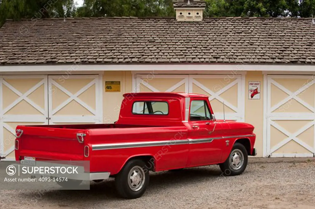 1964 Chevrolet K20 Truck parked by garage rear 7/8