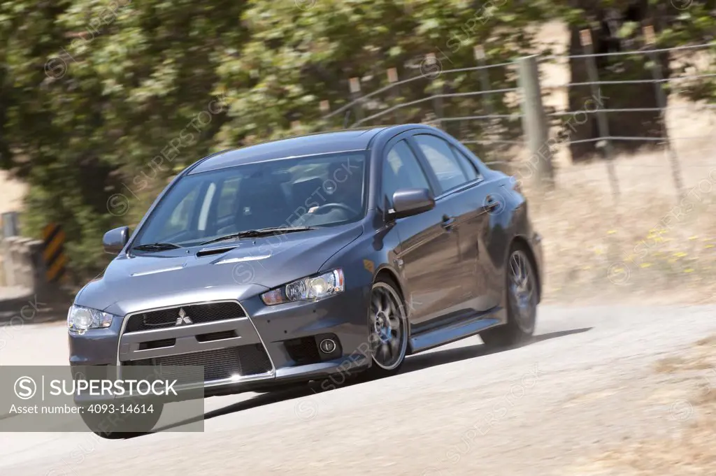 2010 Mitsubishi EVO MR on road, front 3/4