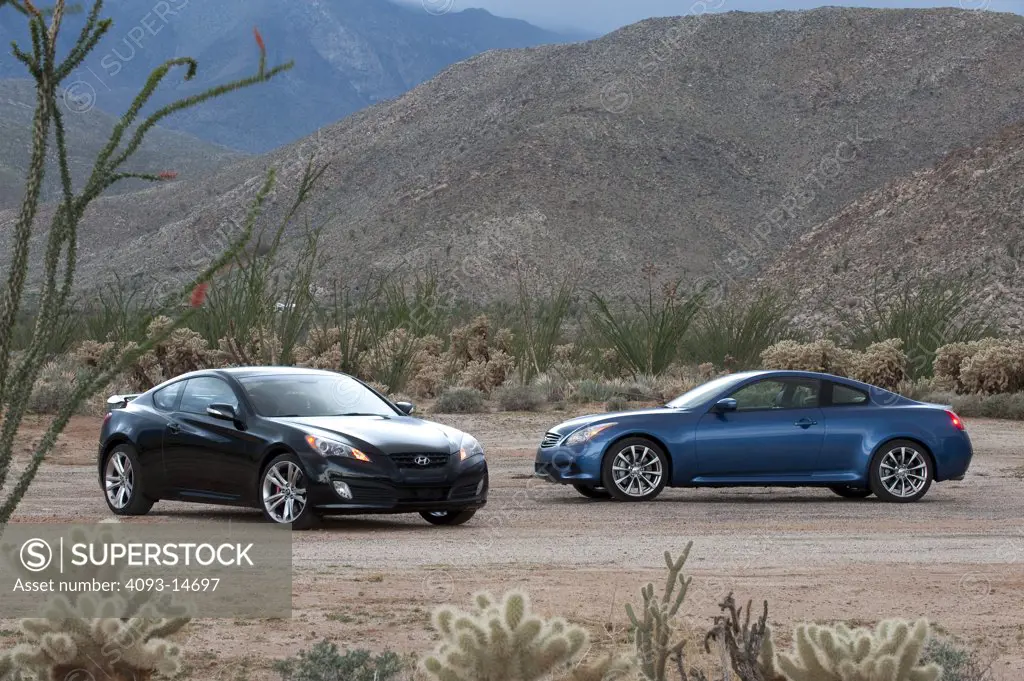 2009 Infiniti G37S parked in desert with 2010 Hyundai Genesis Coupe 2.0T