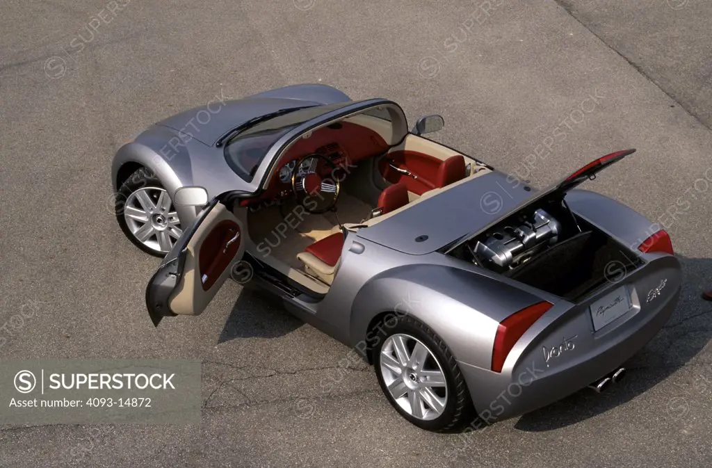 interior Plymouth Pronto Spyder show car concept prototype overhead rear 3/4 asphalt pavement silver trunk open street