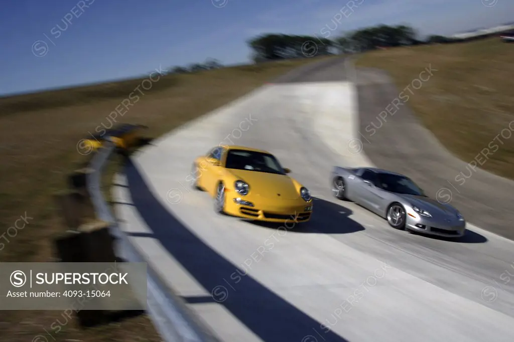 2005 Porsche 911 Carrera 2005 Chevrolet Corvette racer neck close tight