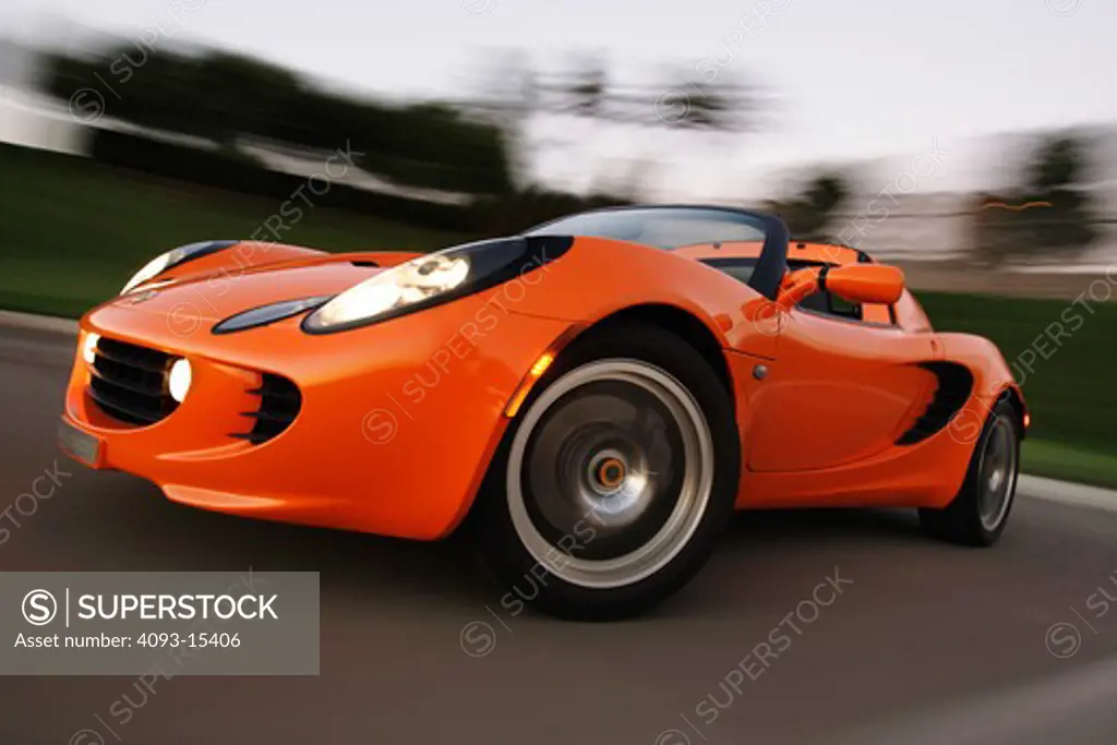 low angle Lotus Elise 2005 orange wheel headlight scoops