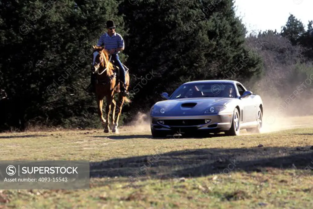 Ferrari 1999 550 Maranello grey Texas horse cowboy front 3/4 dust 1990s street