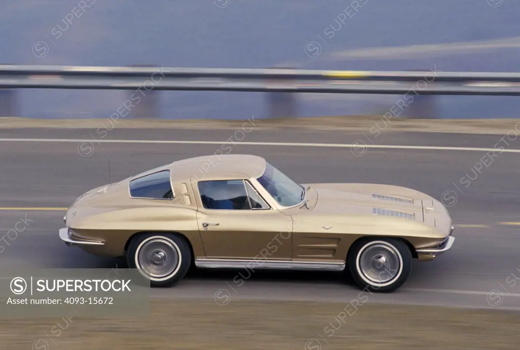 Corvette Stingray 1963 1960s gold Chevy guard rail street