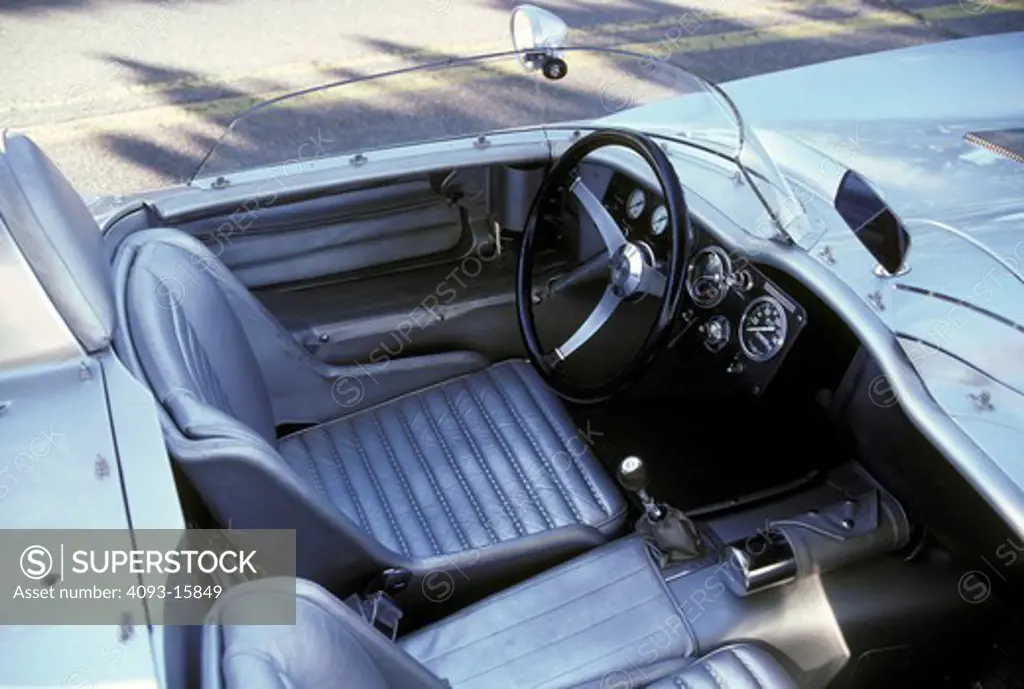 interior detail Corvette Stingray 1958 1950s silver Chevy seat steering wheel gear shift dashboard IP instrument panel gauges speedometer street