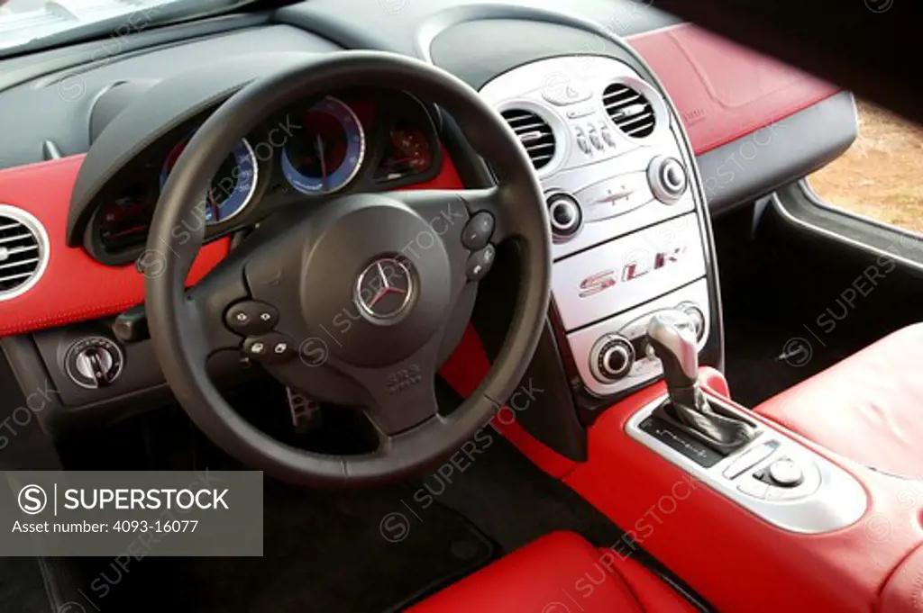 interior detail Mercedes Benz SLR McLaren 2005 steering wheel gear shift silver black red leather dashboard