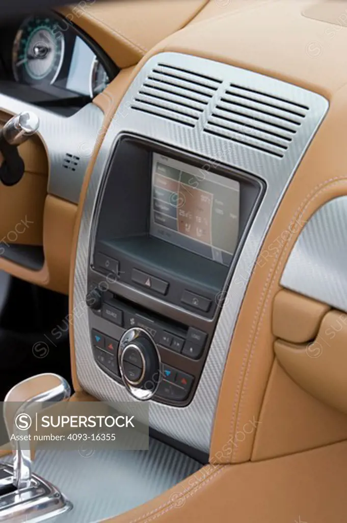 interior detail Jaguar Advanced Lightweight Coupe nav screen buttons tan leather silver trim