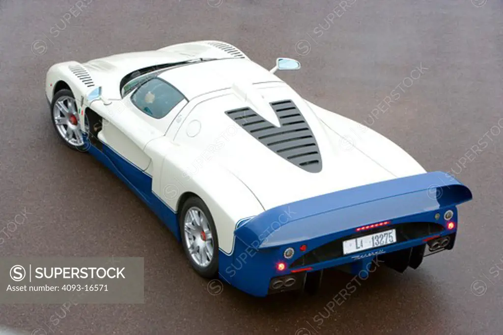 Rear overhead view of a 2007 Maserati MC 12. The Maserati MC12 is a grand tourer produced by Maserati to allow a racing variant to compete in the FIA GT Championship. Maserati designed and built the car on the chassis of the Enzo Ferrari.