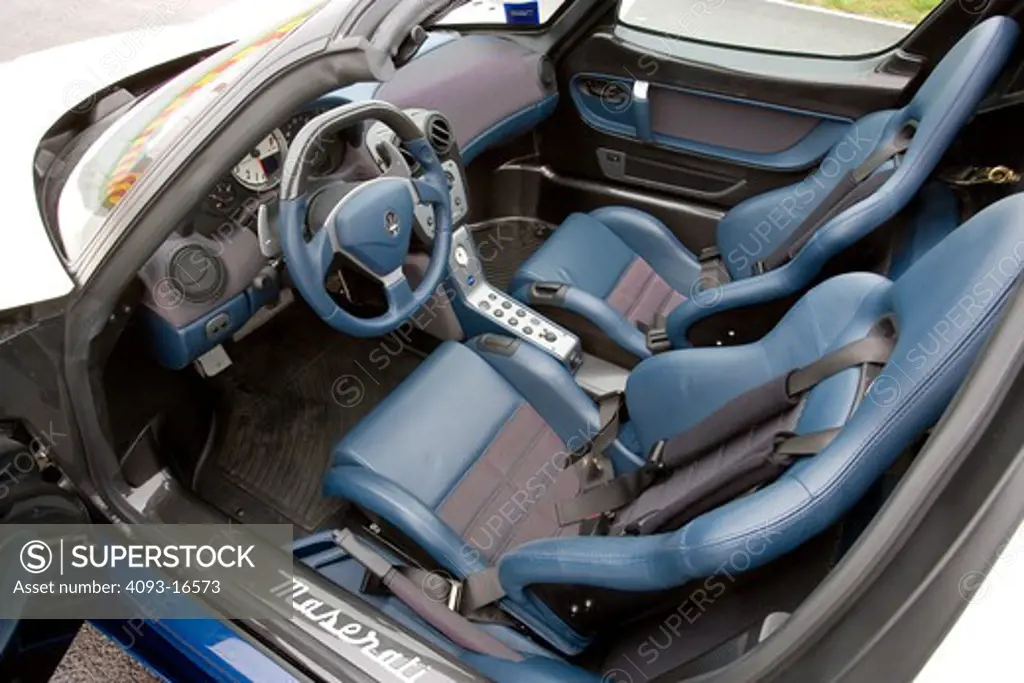 Interior view of a 2007 Maserati MC 12. The Maserati MC12 is a grand tourer produced by Maserati to allow a racing variant to compete in the FIA GT Championship. Maserati designed and built the car on the chassis of the Enzo Ferrari.