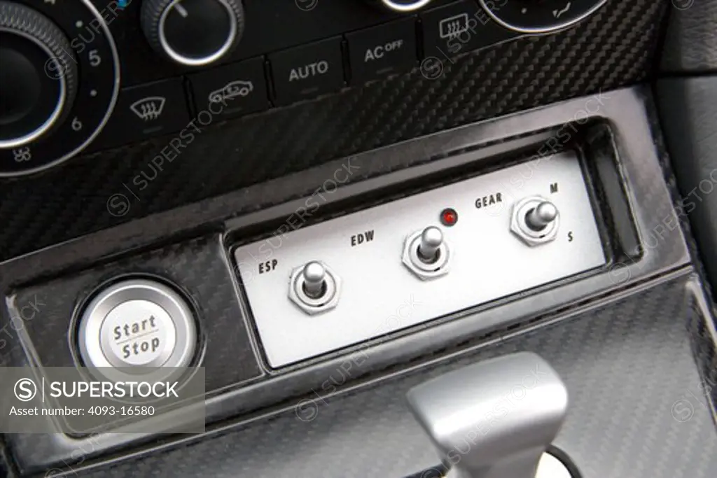 Interior detail view of a 2007 Mercedes-Benz AMG CLK DTM. Showing carbon fiber and the unusual start / stop button. A special version of the CLK is the CLK DTM AMG sports car using AMG's supercharged 5.4 L V8.