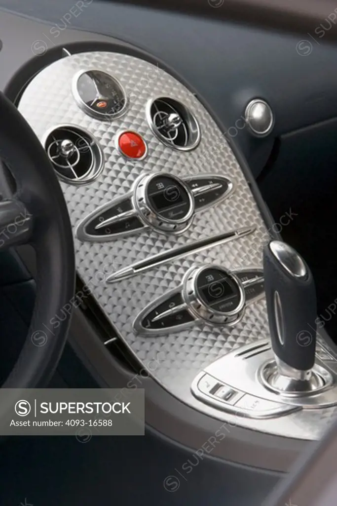 An interior detail view of a 2007 Bugatti Veyron. The Bugatti Veyron 16.4 is currently the fastest, most powerful, and most expensive street-legal full production car in the world, with a proven top speed of 253 mph (407.5 km/h), though several faster or more expensive vehicles have been produced on a limited basis.1 It reached full production in September 2005. The car is built by Volkswagen AG subsidiary Bugatti Automobiles SAS in its Molsheim (Alsace, France) factory and is sold under the l