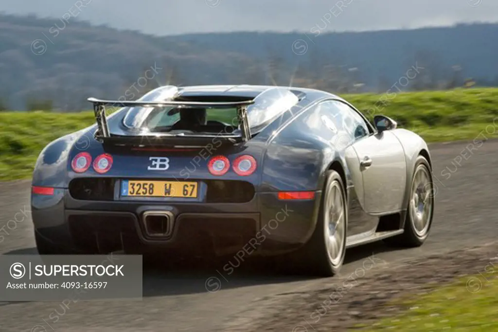 An action shot of a 2007 Bugatti Veyron. The Bugatti Veyron 16.4 is currently the fastest, most powerful, and most expensive street-legal full production car in the world, with a proven top speed of 253 mph (407.5 km/h), though several faster or more expensive vehicles have been produced on a limited basis.1 It reached full production in September 2005. The car is built by Volkswagen AG subsidiary Bugatti Automobiles SAS in its Molsheim (Alsace, France) factory and is sold under the legendary 