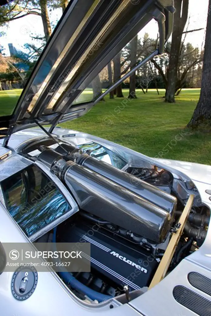 An engine view of the McLaren F1. It was the fastest street legal production car in the world of its time. It was engineered and produced by McLaren Automotive, a subsidiary of the British McLaren Group that, among others, owns the McLaren Mercedes Formula One team. The car features a 6.1-litre 60° BMW S70 V12 engine and it was conceived as an exercise in creating what its designers hoped would be considered the ultimate road car. Only 100 cars were manufactured, 64 of those were street versions